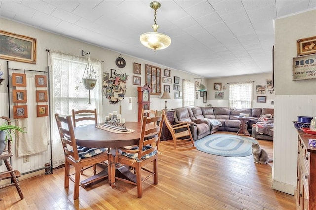 dining area with light wood-style flooring