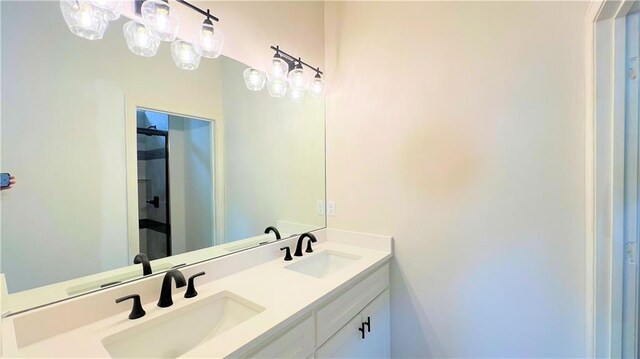 22312 W 76th St, Shawnee, KS 66227 - bathroom featuring double vanity and a shower