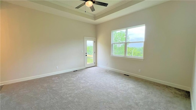 22312 W 76th St, Shawnee, KS 66227 - carpeted empty room featuring ornamental molding, ceiling fan, and a raised ceiling