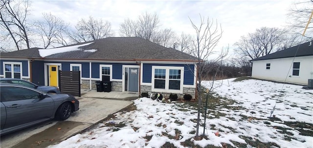 view of front of home with stone siding