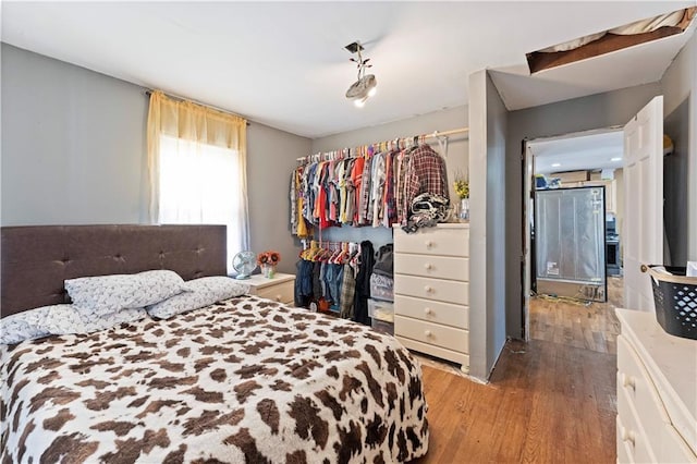 bedroom featuring wood finished floors