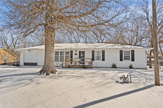 single story home with an attached garage