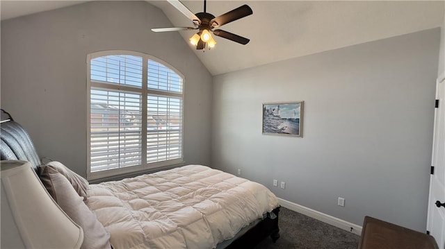 bedroom with vaulted ceiling, carpet floors, a ceiling fan, and baseboards