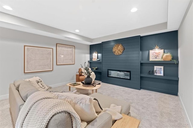 interior space featuring a fireplace, recessed lighting, and baseboards