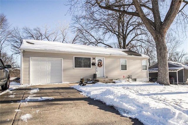 view of front of property with driveway and an attached garage