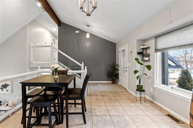 dining room with light tile patterned floors, baseboards, visible vents, vaulted ceiling with beams, and a notable chandelier