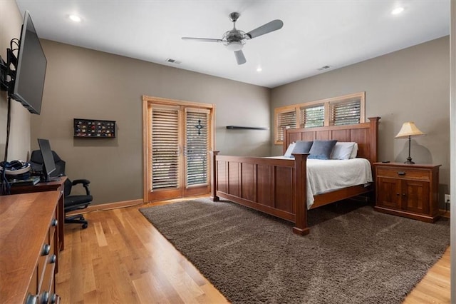 bedroom with light wood finished floors, recessed lighting, visible vents, a ceiling fan, and baseboards