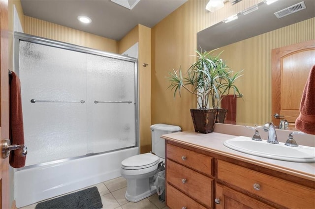 bathroom with enclosed tub / shower combo, tile patterned flooring, toilet, visible vents, and wallpapered walls