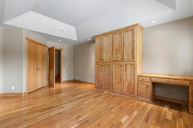 interior space with light wood-style floors, recessed lighting, and baseboards