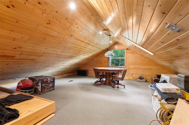 bonus room with lofted ceiling, wooden ceiling, wooden walls, and carpet floors