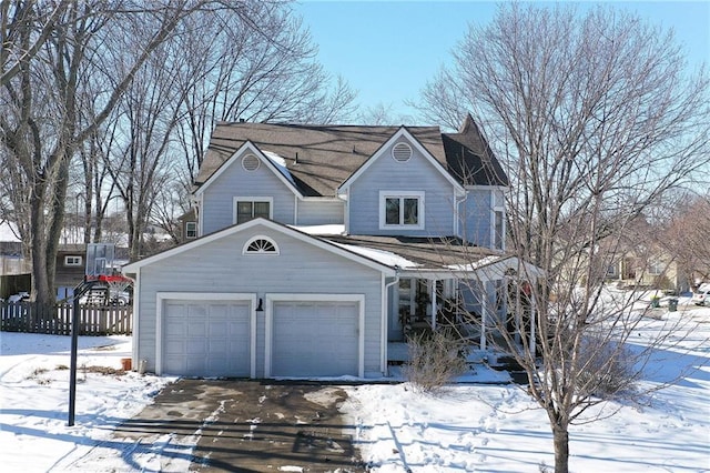 exterior space featuring a garage and fence