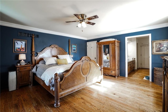 bedroom with ornamental molding, a ceiling fan, and wood finished floors