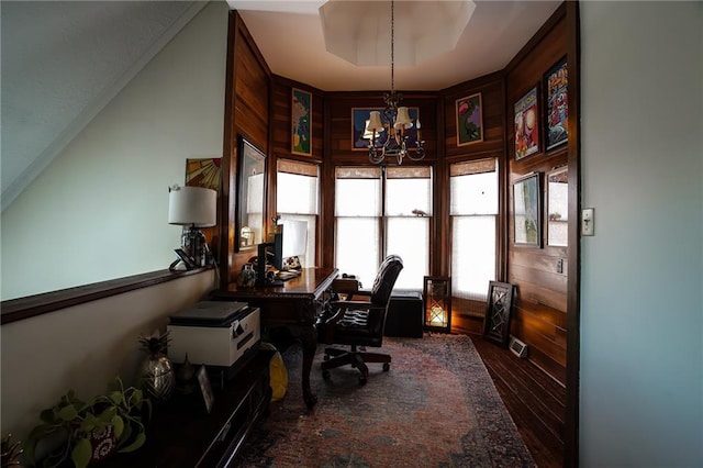 office space featuring a chandelier and wood finished floors