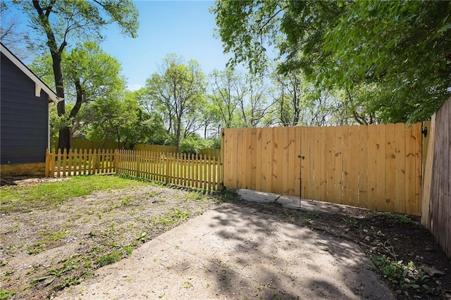 view of yard featuring fence private yard and a patio area