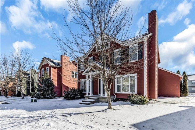 view of front of house with a chimney