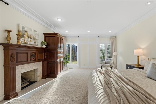 bedroom featuring light carpet, ornamental molding, a premium fireplace, and recessed lighting