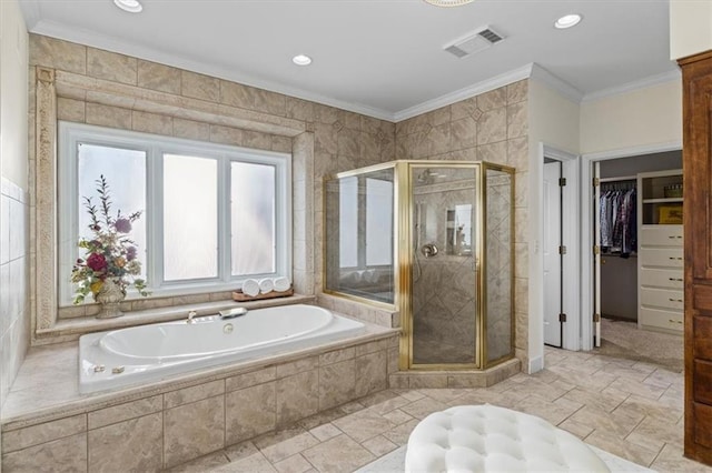 full bathroom featuring visible vents, crown molding, a shower stall, and a bath