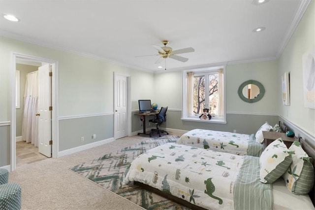 carpeted bedroom with baseboards, a ceiling fan, ensuite bath, ornamental molding, and recessed lighting