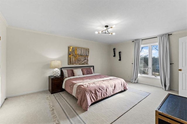 bedroom with an inviting chandelier, baseboards, ornamental molding, and light colored carpet