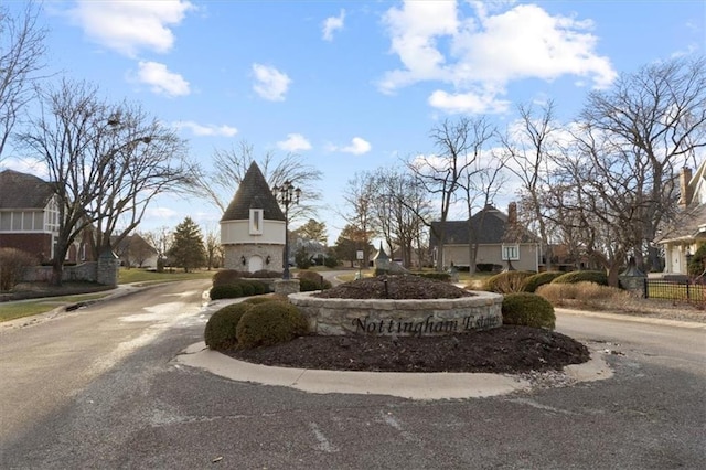 view of street with curbs and a residential view