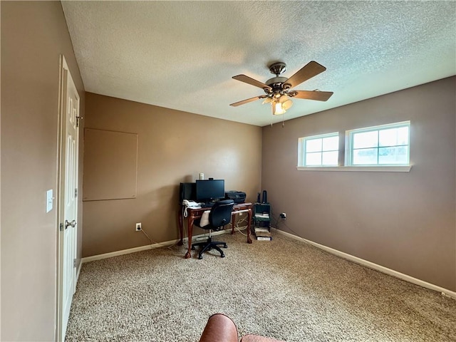718 Oakland Ave, Kansas City, KS 66101 - office area featuring ceiling fan, a textured ceiling, carpet flooring, and baseboards