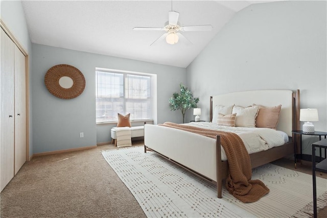 bedroom with light carpet, a ceiling fan, baseboards, vaulted ceiling, and a closet