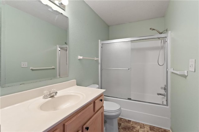 full bath featuring toilet, enclosed tub / shower combo, a textured ceiling, and vanity