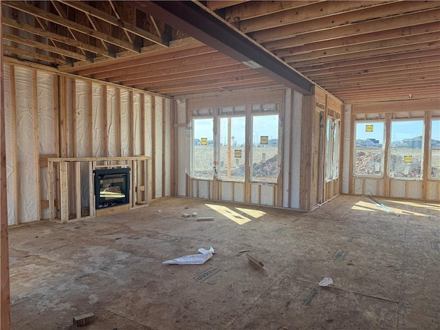 unfurnished living room featuring a healthy amount of sunlight