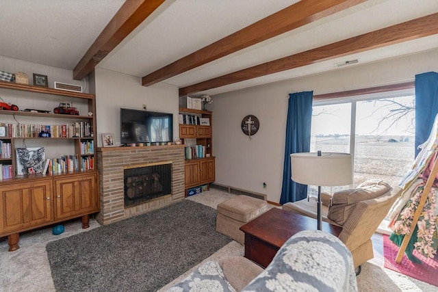 living area featuring a fireplace, visible vents, carpet flooring, beamed ceiling, and baseboards