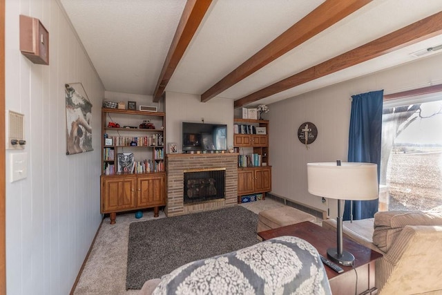 living room with baseboards, visible vents, carpet floors, a brick fireplace, and beam ceiling