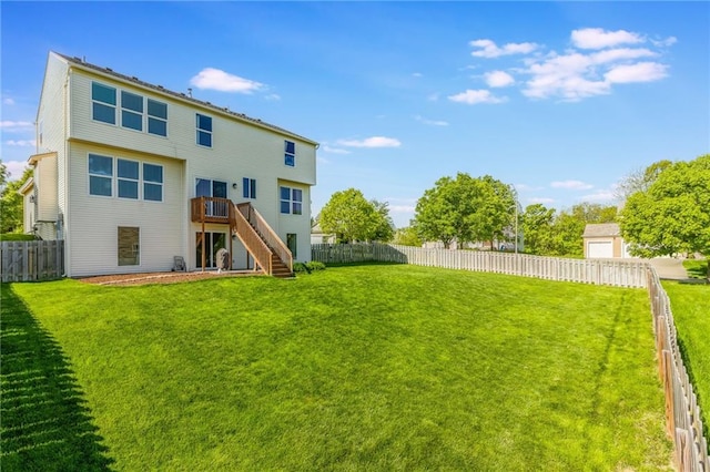 1716 NW 54th Ter, Kansas City, MO 64118 - back of property with stairway and a wooden deck