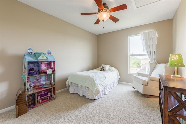 1716 NW 54th Ter, Kansas City, MO 64118 - carpeted bedroom featuring baseboards and a ceiling fan