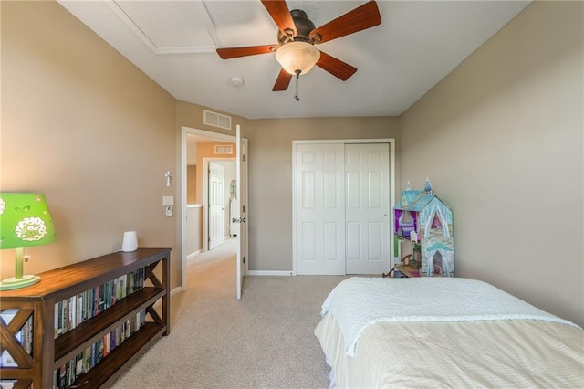 1716 NW 54th Ter, Kansas City, MO 64118 - bedroom with light colored carpet, a closet, a ceiling fan, and baseboards