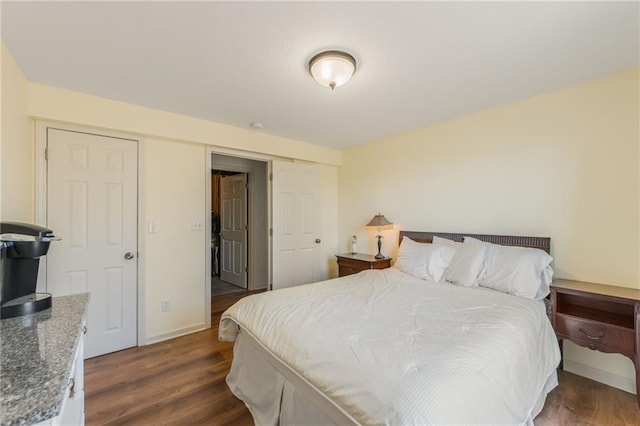 1716 NW 54th Ter, Kansas City, MO 64118 - bedroom featuring wood finished floors and a closet