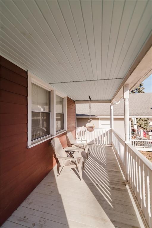 wooden deck with a porch