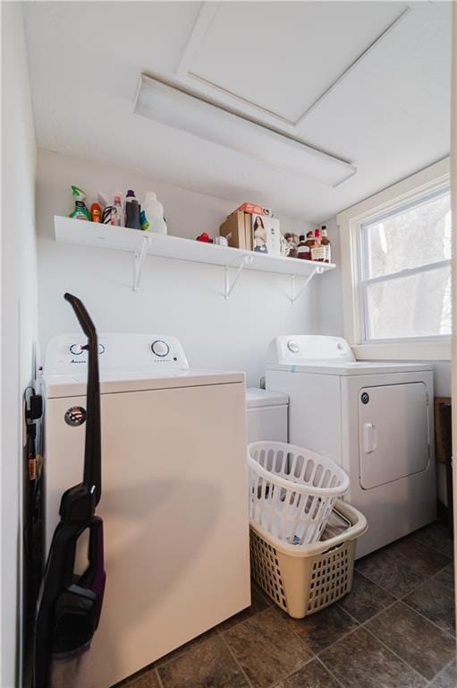 laundry area featuring attic access, washer and dryer, and laundry area