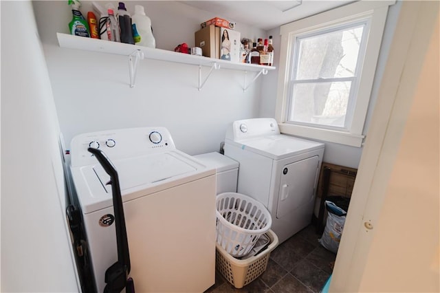 laundry room with washing machine and dryer and laundry area