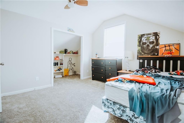 bedroom with lofted ceiling, carpet flooring, ceiling fan, and baseboards