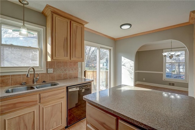 kitchen featuring arched walkways, ornamental molding, decorative backsplash, a sink, and dishwasher