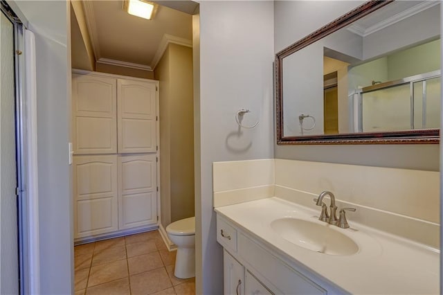 full bath with tile patterned flooring, a stall shower, toilet, and ornamental molding