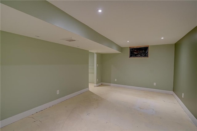 finished basement with visible vents, recessed lighting, and baseboards