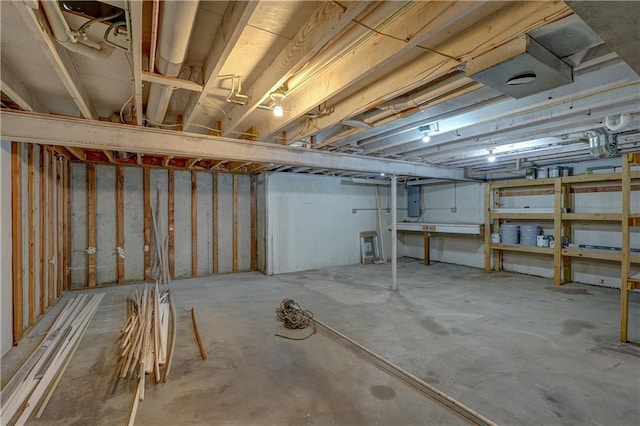 unfinished basement with electric panel