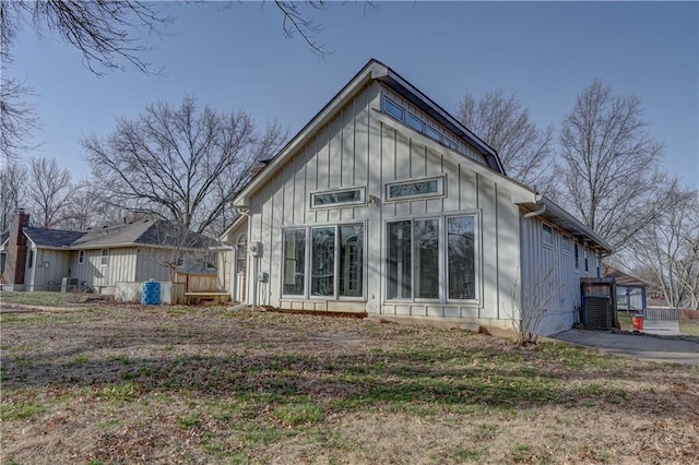 back of property with board and batten siding