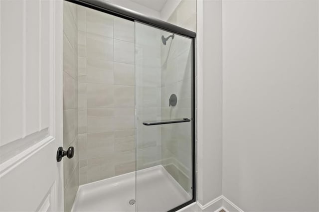 bathroom with a stall shower