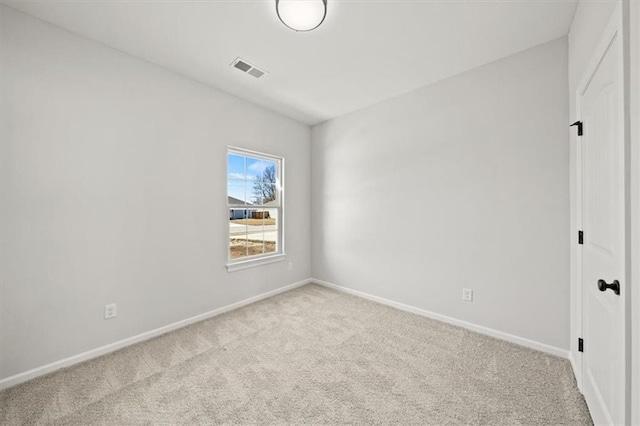 unfurnished bedroom featuring carpet floors, visible vents, and baseboards