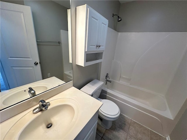 full bathroom featuring tile patterned flooring, shower / bathing tub combination, vanity, and toilet