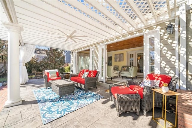 view of patio featuring an outdoor living space and a pergola