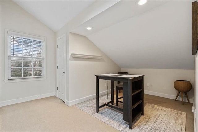 interior space with lofted ceiling, carpet, baseboards, and recessed lighting