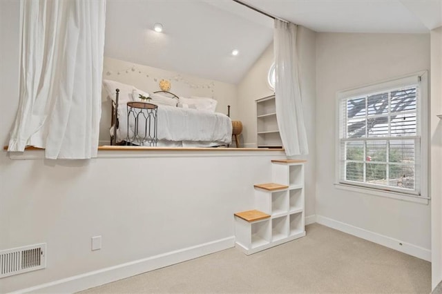 unfurnished bedroom with baseboards, visible vents, lofted ceiling, carpet flooring, and recessed lighting