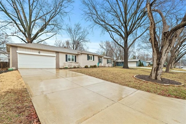 ranch-style home with concrete driveway, brick siding, a front lawn, and an attached garage